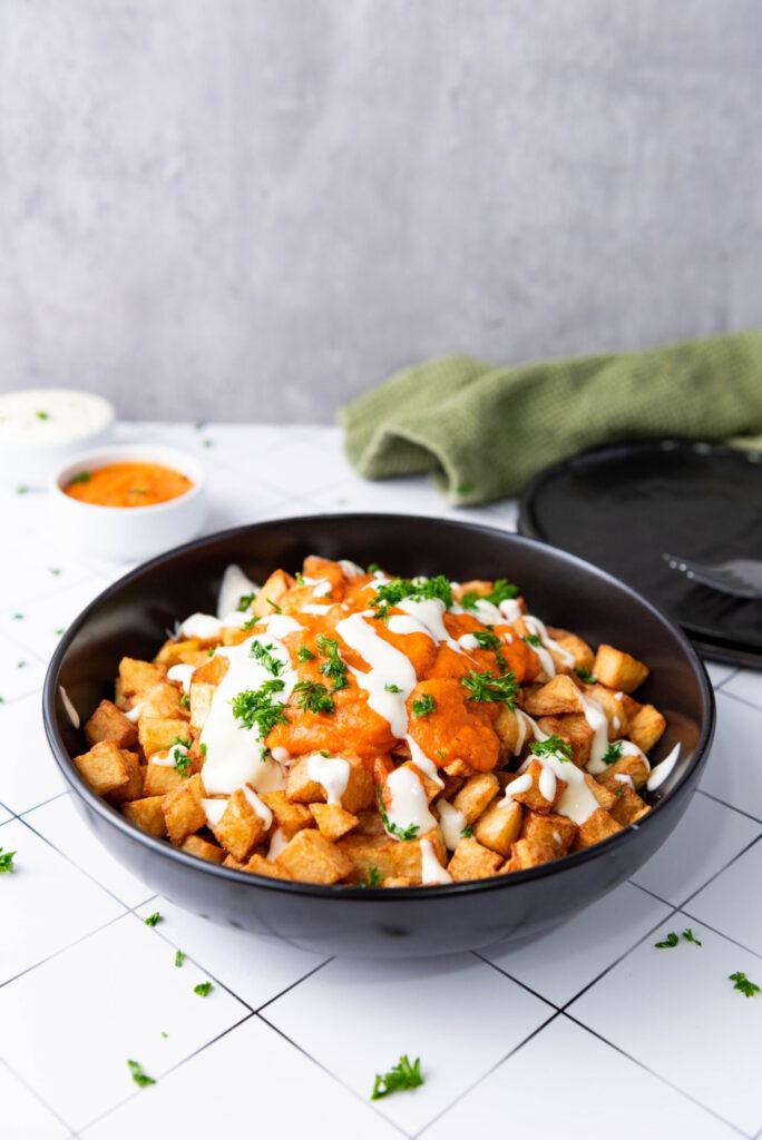 Traditional Spanish Patatas Bravas With Garlic Aioli